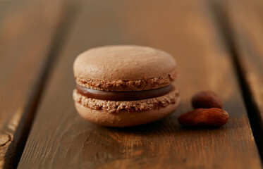 chocolate macaroon on brown wooden surface