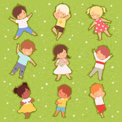 Happy Kids Lying Down on Green Lawn Set, Cute Smiling Children Having Fun Outdoors, View from Above Cartoon Vector Illustration