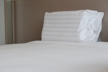 White pillows on the bed.