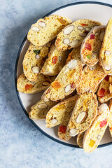 Traditional Italian cookies biscotti, cantucci or cantuccini with almond and dry fruits. Top view.