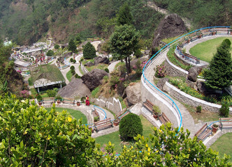 Tourists enjoying the beauty of nature at Rock Garden in Darjeeling, India. After seven months of...
