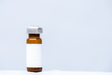  vaccine bottle with a blank label. Isolated from background