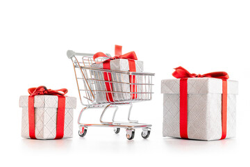 Stainless steel cart. Trolley cart for supermarket with christmas or birthday gift box isolated on...