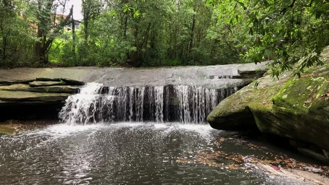 Strong flow at Terry's Creek waterfall at Epping, Sydney, Australia.