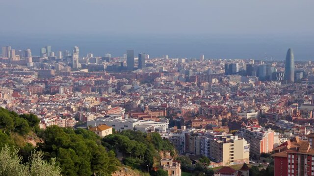 Panning panoramic shot over polluted barcelona skyline, famous mediterranean city in Spain. beautiful view of touristic Catalonia capital