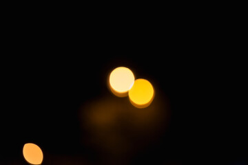 abstract background. blur bokeh.Two yellow Light from the lamp at night.