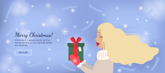 Girl with Christmas gift in hands 