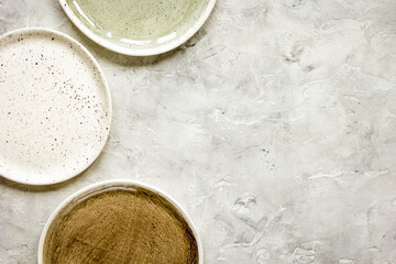 ceramic tableware top view on stone background mock up