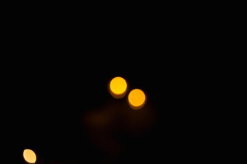abstract background. blur bokeh.Two yellow Light from the lamp at night.