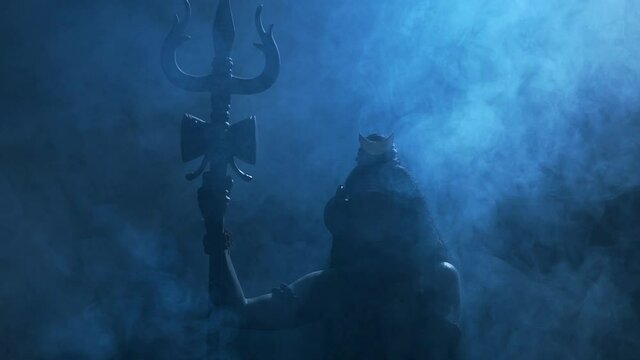 Shiva,. Lord Mahadeva Silhouette meditation sitting Posture with Trishul in Hand Indian Hindu God