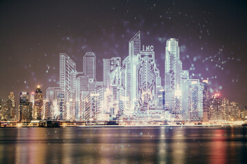 Fototapeta na wymiar Double exposure of buildings hologram over cityscape background. Concept of smart city.