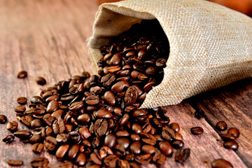 Coffee beans coming out of the sack