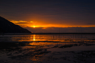 Obraz premium Sunrise scenery by the sea