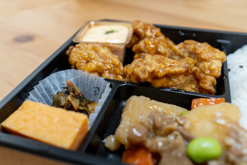 Japanese chicken nanban bento comes with tartar sauce.