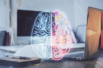 Double exposure of work space with computer and human brain drawing hologram. Brainstorm concept.