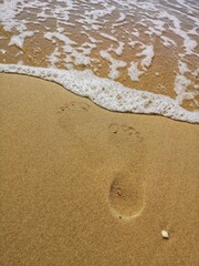 footprints on the beach