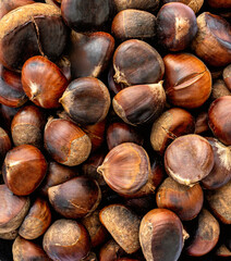 Roasted chestnuts as Background. Chestnuts for Christmas close-up..