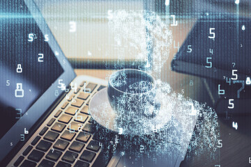 Double exposure of desktop computer and technology theme hologram. Concept of software development.