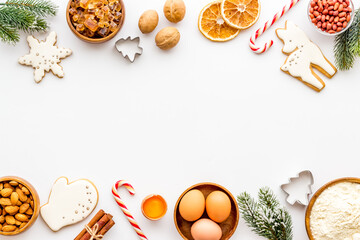 Fototapeta na wymiar Christmas winter dessert - icing gingerbread cookies, top view