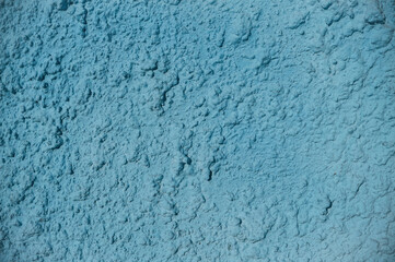 Fototapeta na wymiar Blue texture of old plaster