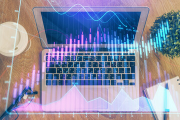 Multi exposure of chart and financial info and work space with computer background. Concept of international online trading.