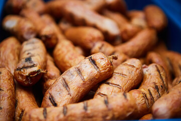 Production line of sausage products. Sausage hanging on the counter of the store. Meat products