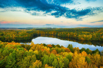 Golden autumn of Poland by the Straszyn lake from above.