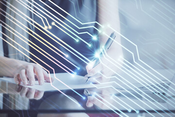 Double exposure of woman's writing hand on background with data technology hud. Big data concept.