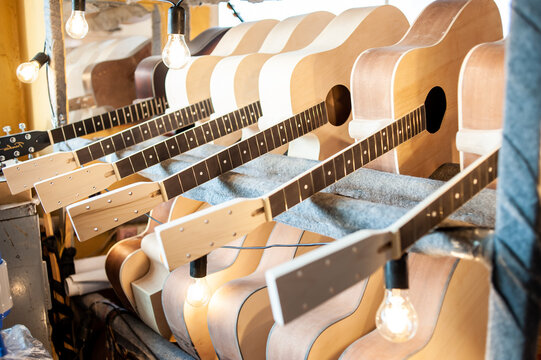 Guitar manufacturing is the use of machines, tools, and labor in the production of electric and acoustic guitars.