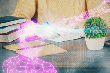 AR hologram over woman's hands taking notes background. Concept of augmented reality. Multi exposure