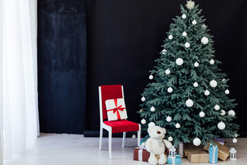 Christmas tree pine with gifts new year decor black background