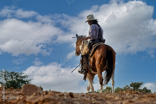 pic Cowboy Shooting On Horseback wallsheaven