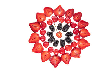 red raw fresh strawberries and cherries with blackberries on white background, close view 