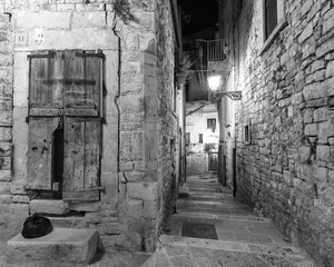 narrow street in the town B&W
