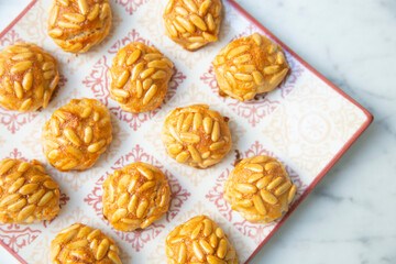 Almond and pine nuts Panellets . Traditional Catalan sweet made with potato, egg, sugar, almonds and pine nuts. Prepares to celebrate Halloween and November 1st