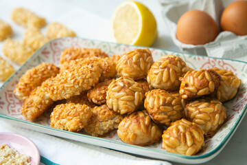 Almond and pine nuts Panellets . Traditional Catalan sweet made with potato, egg, sugar, almonds and pine nuts. Prepares to celebrate Halloween and November 1st