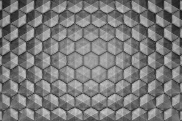 Honeycombs. Background abstract minimalistic black / white texture with many rows of volumetric figures of hexagons lying in the light. Animation. Mobile briquette silver wall