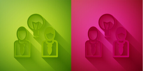 Paper cut People with lamp bulb icon isolated on green and pink background. Concept of idea. Paper art style. Vector.