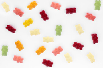 Colorful eat gummy bears jelly candy Isolated on white background. Top view. 