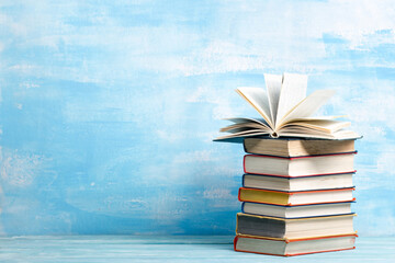Books on wooden desk table and abstract background. Education background. Copy Space. Back to school.