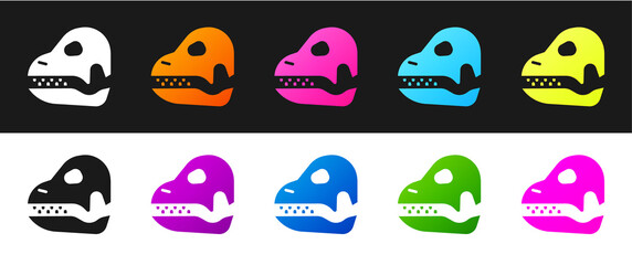 Set Dinosaur skull icon isolated on black and white background. Vector.