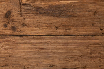 Old textured wood surface with flaws. Natural background of larch boards. Brown color