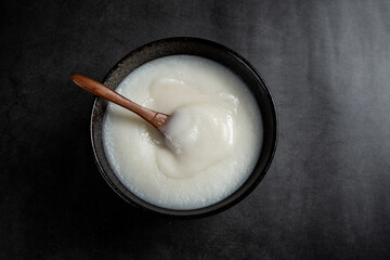A bowl of lard that has just begun to solidify