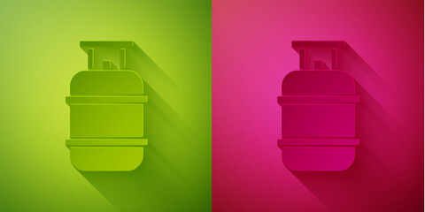 Paper cut Propane gas tank icon isolated on green and pink background. Flammable gas tank icon. Paper art style. Vector.