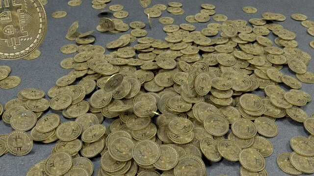 3D render of gold bitcoins falling on the ground