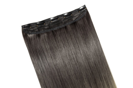 close up texture of single piece clip in straight black to blonde ombre style synthetic hair extensions