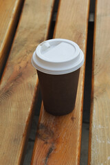 A glass of coffee on the street in the Park. background for the design.