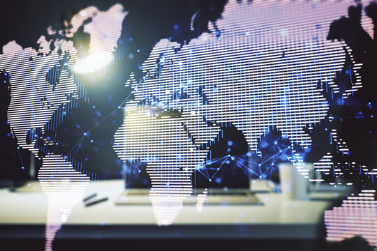 Abstract creative world map on modern laptop background, international trading concept. Multiexposure