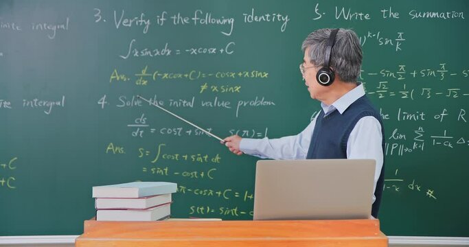 Senior professor teaching online