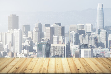 Wooden table top with beautiful San Francisco skyline on background, mockup